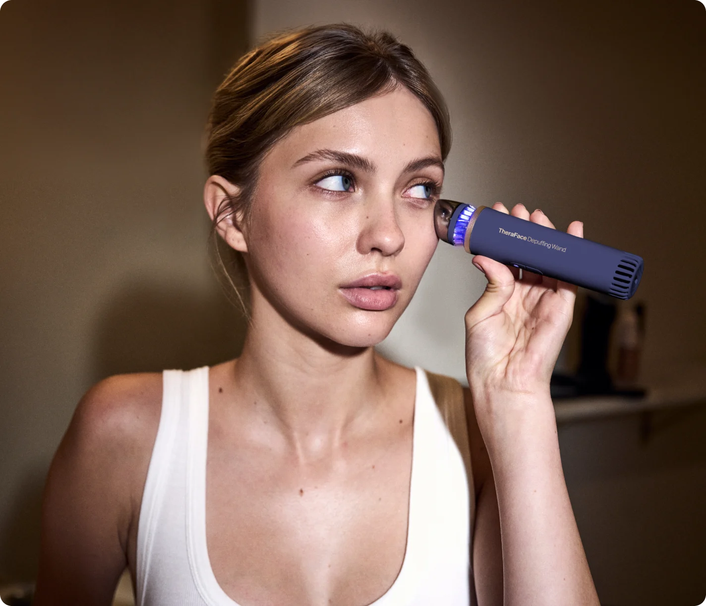 מכשיר עיסוי TheraFace Depuffing