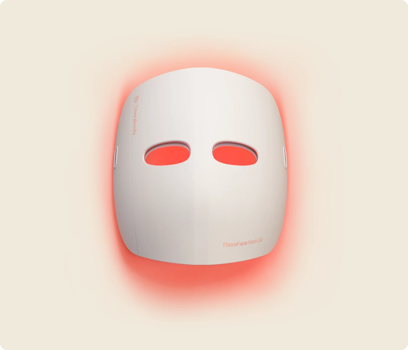 Woman wearing TheraFace Mask Glo red light