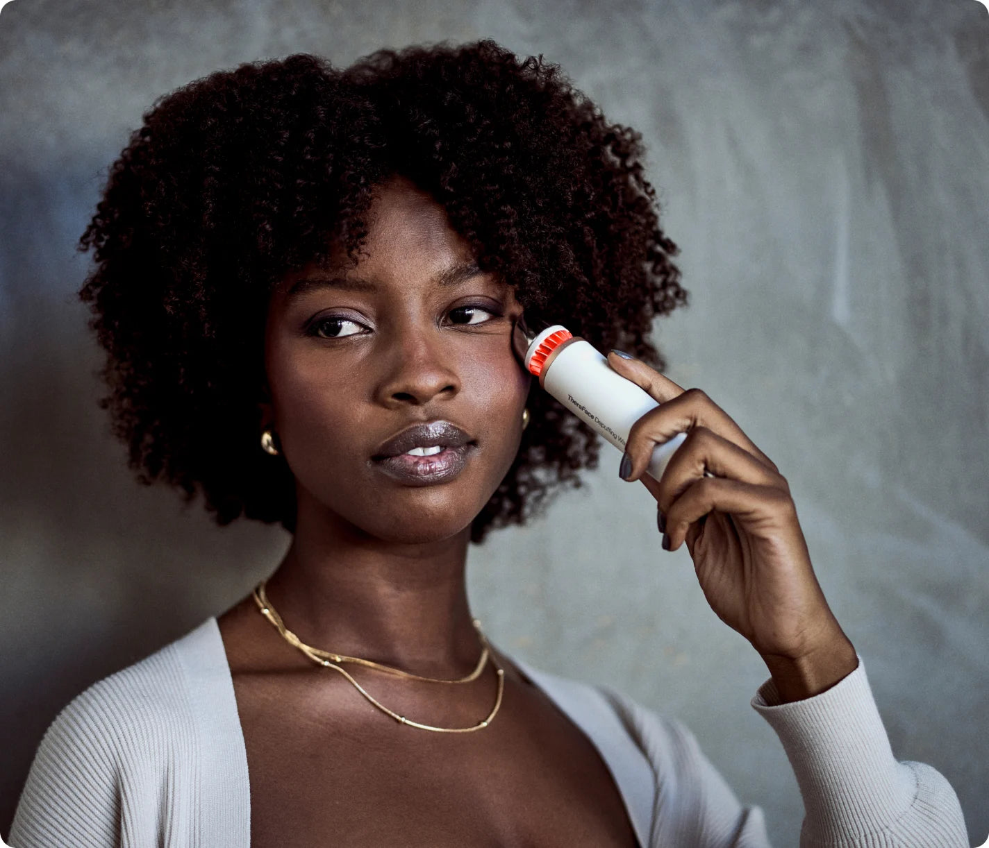 מכשיר עיסוי TheraFace Depuffing