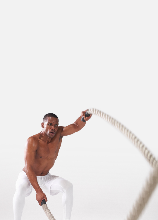 Man working arms out with ropes