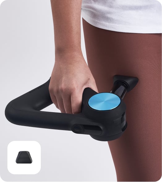 Woman using Theragun PRO device with Wedge attachment